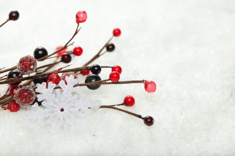 Christmas background with Snowflake and red holly berry in white