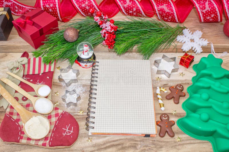 Christmas baking cake background. A recipe book with free text space. Ingredients and tools for baking - flour, Christmas tree