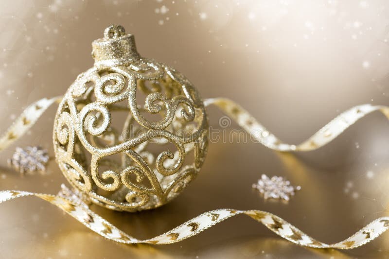 Christmas ball on a gold background