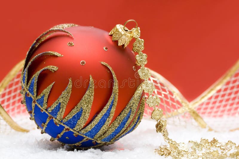 Christmas ball on red