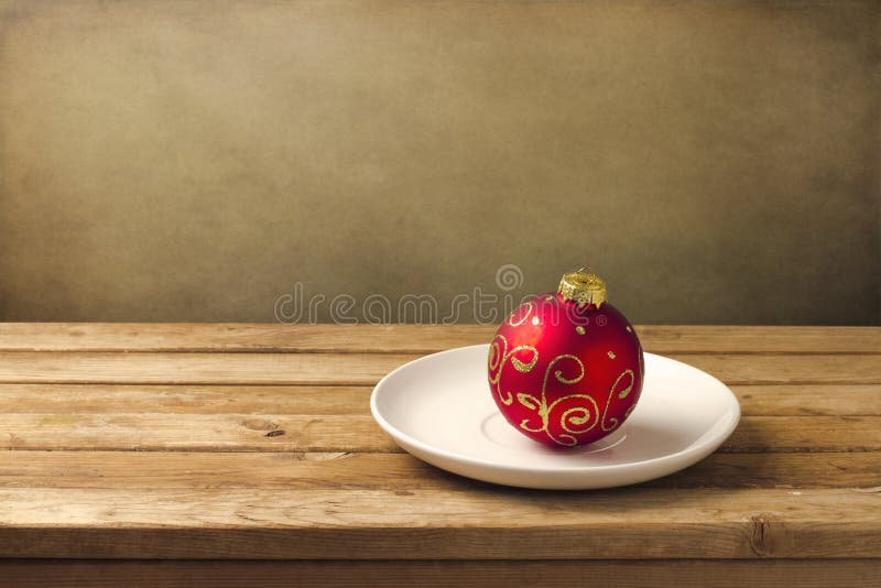 Christmas ball on white plate