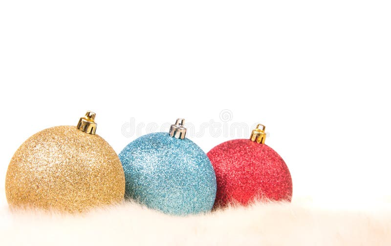 Christmas balls on fur stock image. Image of yellow, christmas 26107271