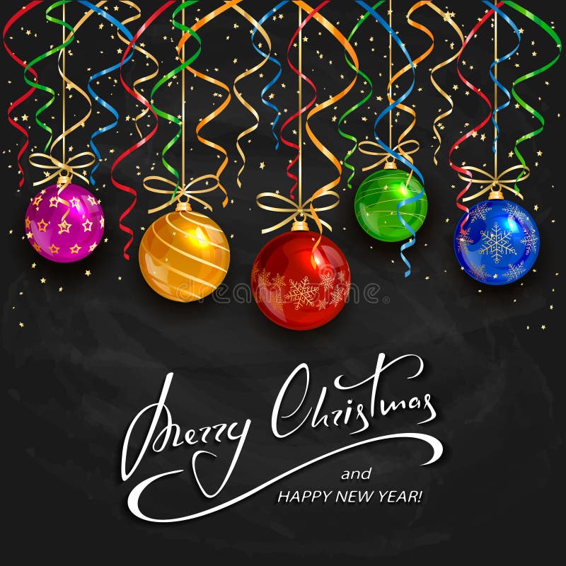 Christmas balls with holiday decorations on black chalkboard background