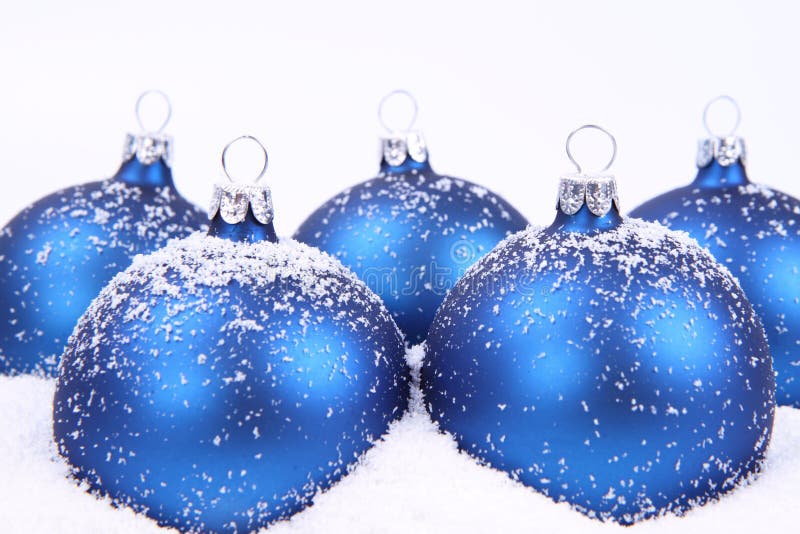 Christmas balls on snow