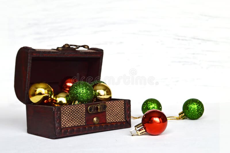 Christmas balls in wooden treasure box