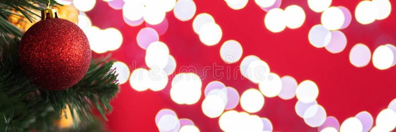 Christmas Banner,red Ball on Christmas Tree with Glowing Magic Lights on Background Stock Image 