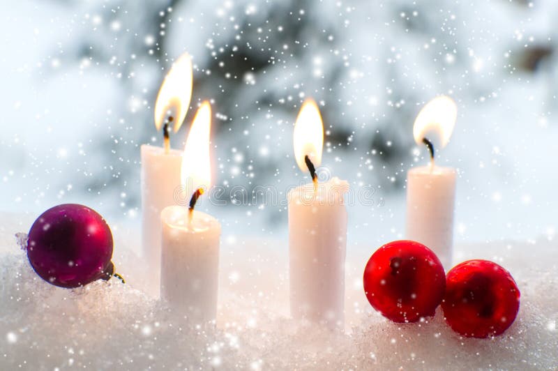 Christmas Baubles an Burning Candles in Snow Stock Image Image of