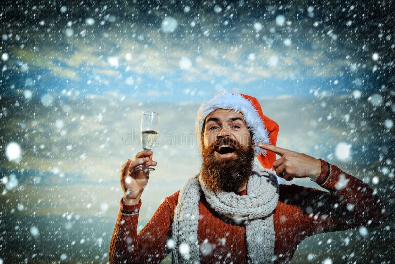 Christmas bearded man with champagne