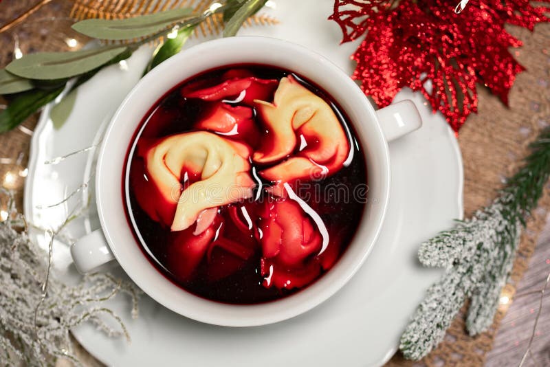 Christmas beetroot soup, traditional Polish Christmas beetroot soup with dumplings stock photos