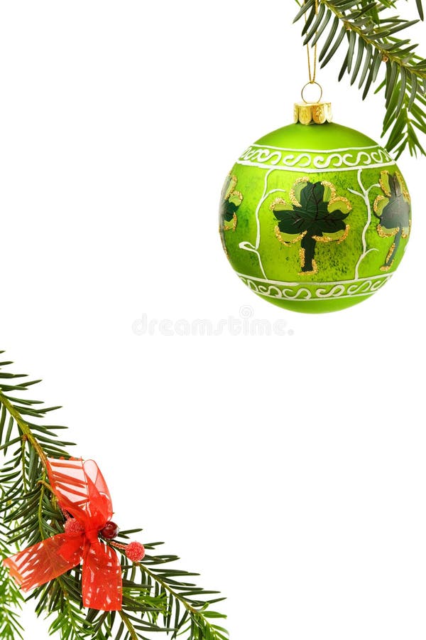 Christmas festive border with handpainted Irish green bauble, lucky shamrock, pine tree branch and red ribbons. Isolated over white with room for your text. Christmas festive border with handpainted Irish green bauble, lucky shamrock, pine tree branch and red ribbons. Isolated over white with room for your text.