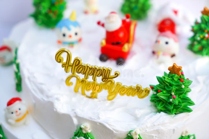 Christmas Cake Decorated with Sweet Figures of Christmas Tree, Santa ...