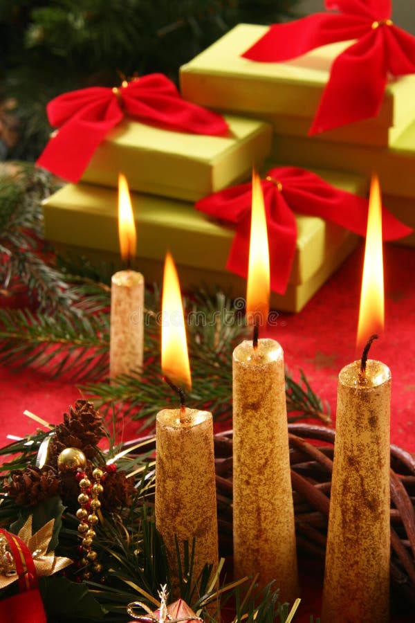 Christmas candle and gifts