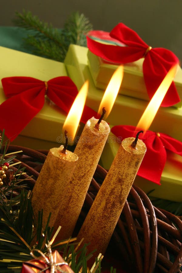 Christmas candle and gifts