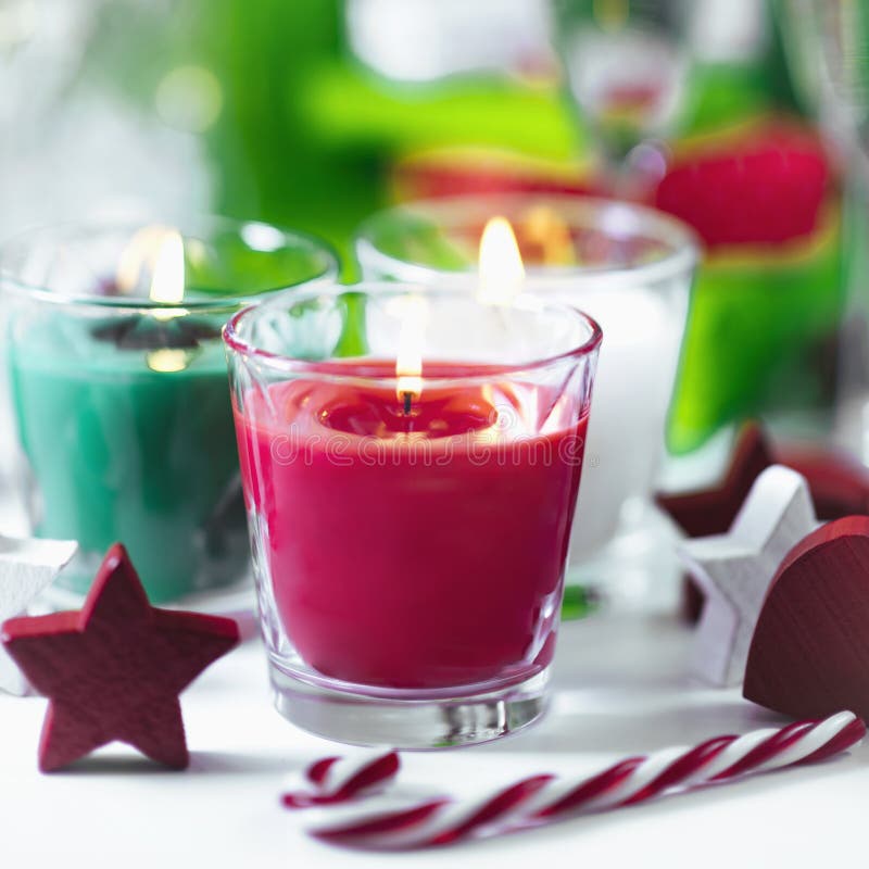 Christmas Candles. Decorative Red and Green Candles with Ornaments Christmas Decorative Candles