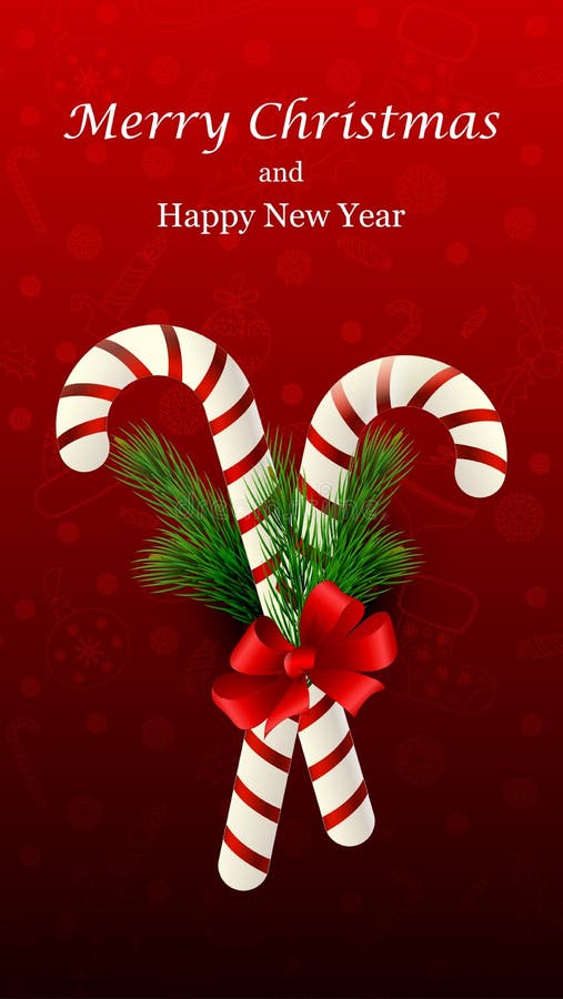 Christmas Candy Cane Decorated with a Bow and Tree Branches Stock