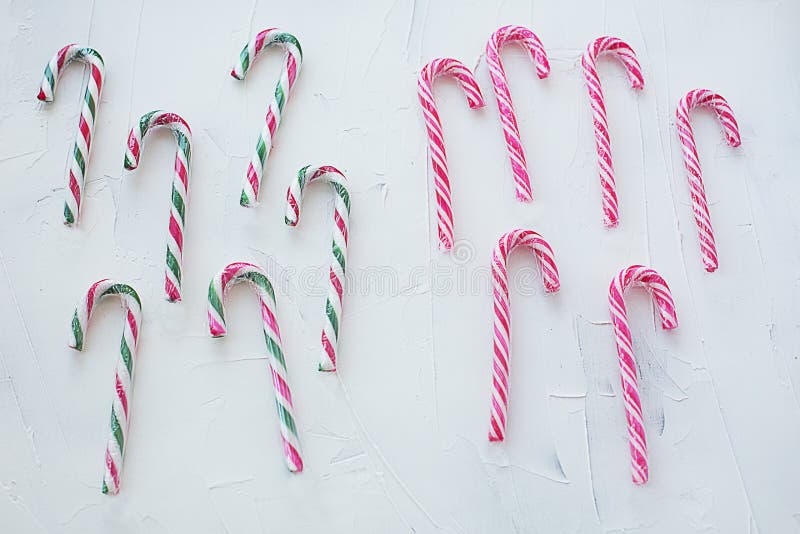Christmas Candy Cane Red with Green with White on Textured Background