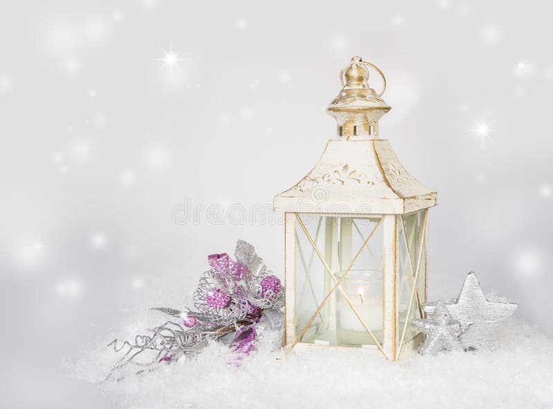 Christmas card with lantern, decorations and snow