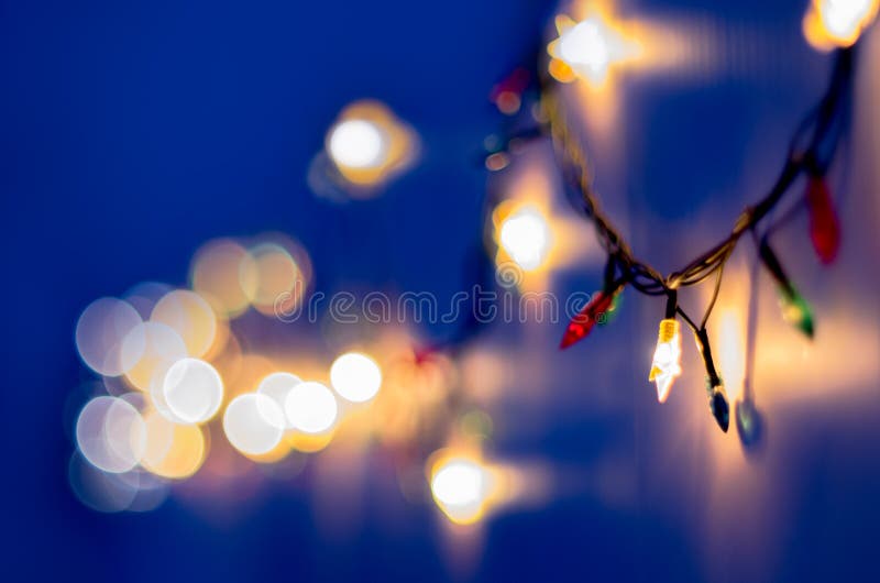 Christmas, Celebration Concept Blurred Colorful Lights on Blue