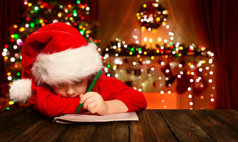Christmas Child Write Letter Santa Claus, Kid in Hat Writing royalty free stock images Christmas Child Write Letter Santa Claus, Kid in Hat Writing royalty free stock images