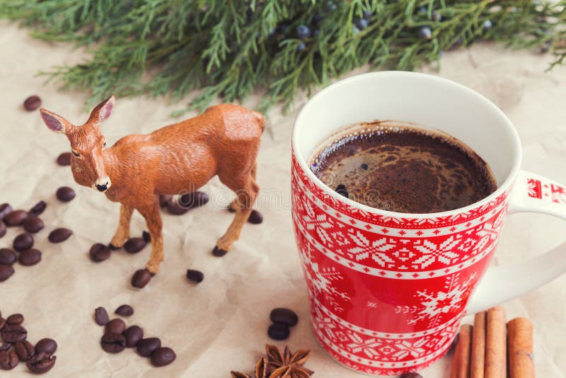 Cup of coffee and deer stock image. Image of reflection 61432475
