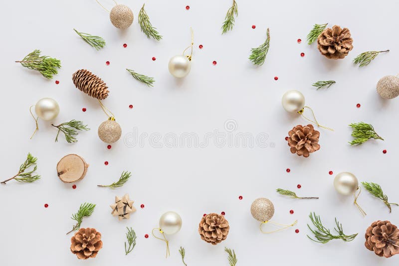 Christmas composition. Pines, golden balls, fir branches on white. new year concept. Greeting card, winter holidays, xmas. Celebration 2020. Flat lay, top view stock images