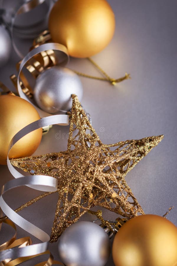 Christmas composition of Christmas tree toys on a blurred silver background