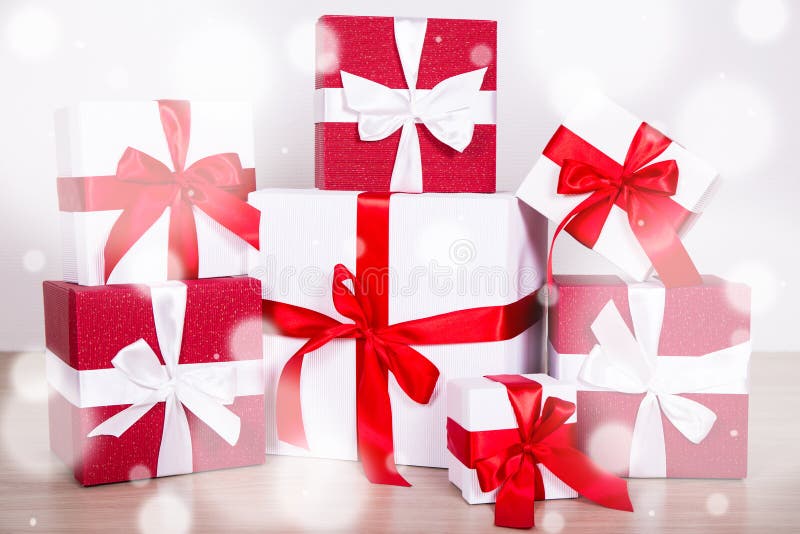 Christmas Concept - Red and White Gift Boxes on Wooden Floor Stock ...