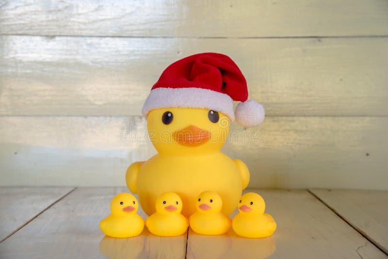 Christmas concept, rubber yellow duck wear Santa clause hat