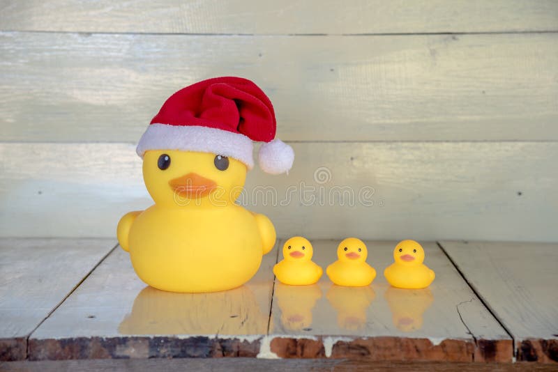 Christmas concept, rubber yellow duck wear Santa clause hat