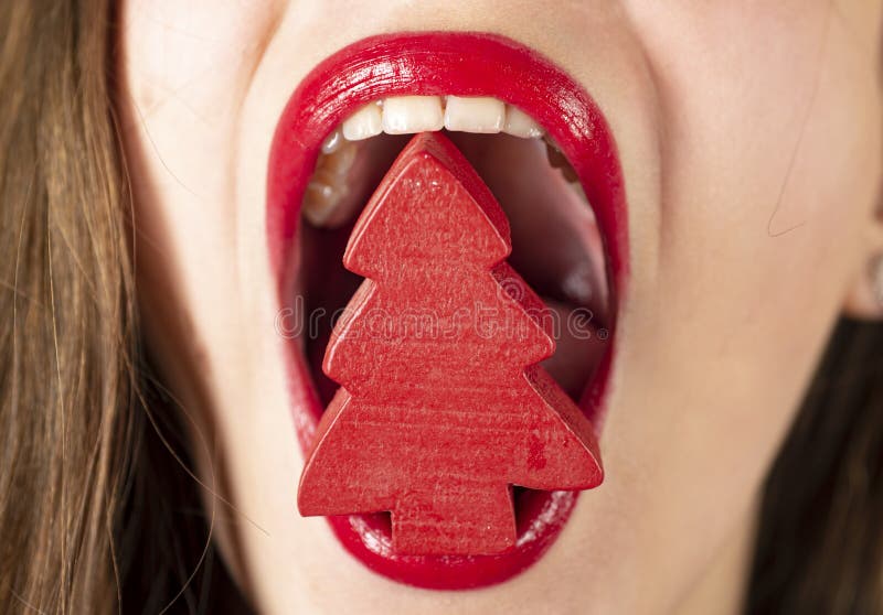 Christmas Concept. Tree in Red Lips Mouth with Makeup. Colorful Bright