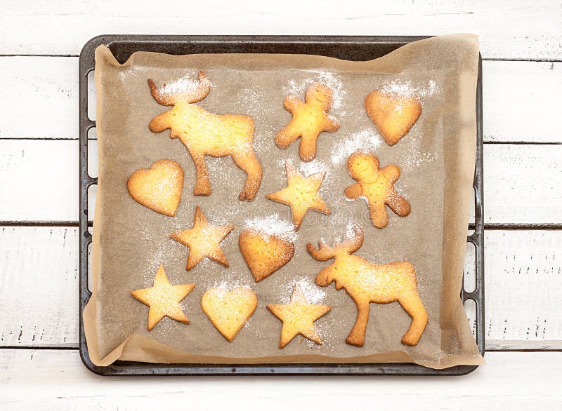Christmas cookies on a baking tray with free text space