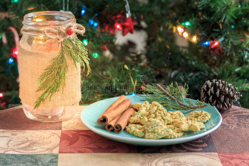 Christmas cookies on green plate with Christmas tree