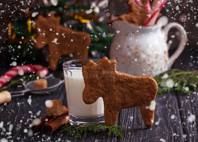 Christmas cookies in shape of deer and milk