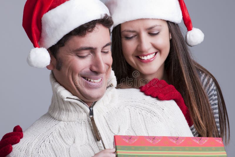 Christmas Couple stock photo. Image of looking, horizontal - 16868642