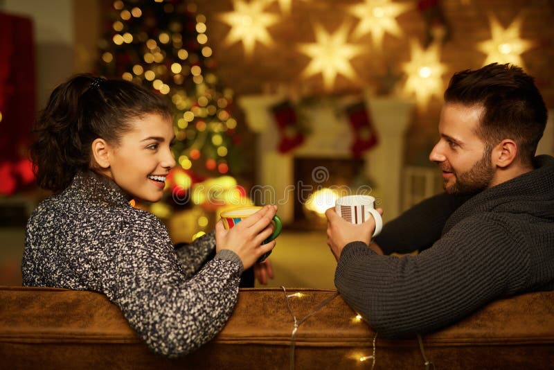 Christmas couple at home in Winter royalty free stock image