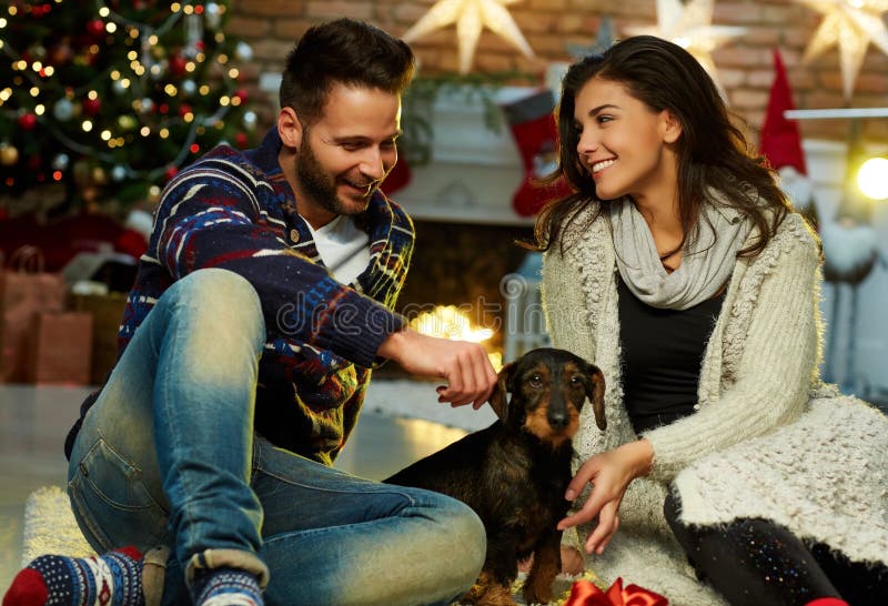 Christmas couple at home in Winter royalty free stock photography