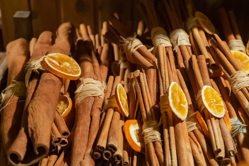 Christmas Decor Cinnamon Sticks and Orange, Culinary Background Stock
