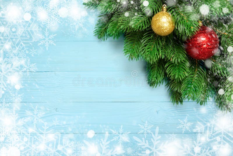 Christmas decoration with fir branches, snowflake on blue board wooden background with copy space stock photo Christmas decoration with fir branches, snowflake on blue board wooden background with copy space stock photo