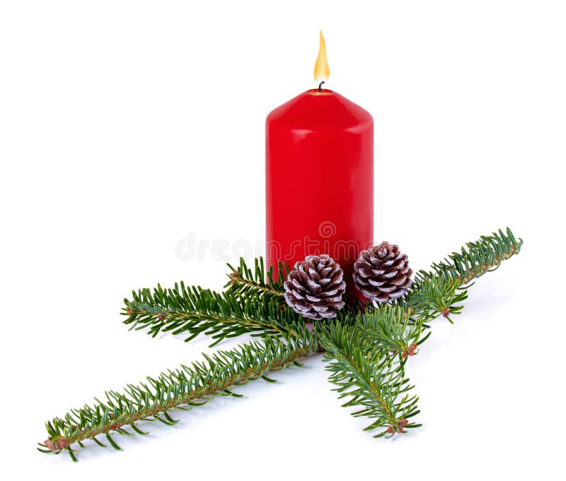 Christmas decoration - red burning candle, spruce branch and cones isolated on white background with shadow reflection.