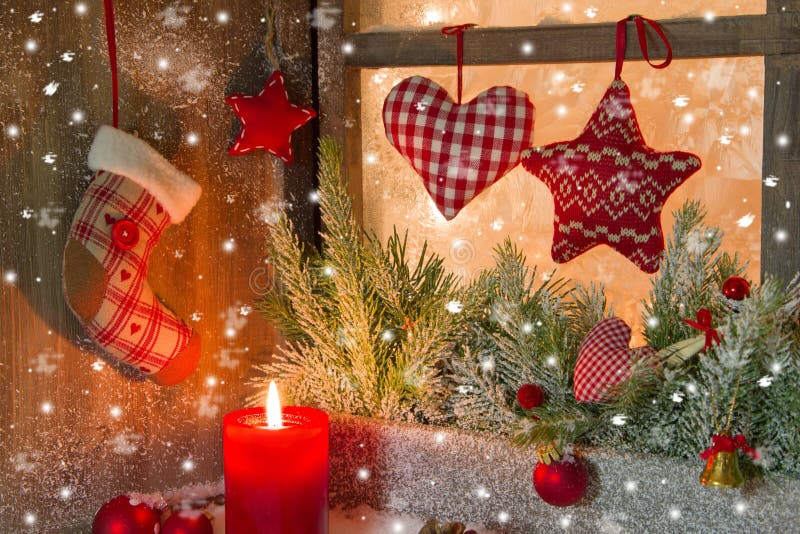 Christmas decoration with red candle and hearts