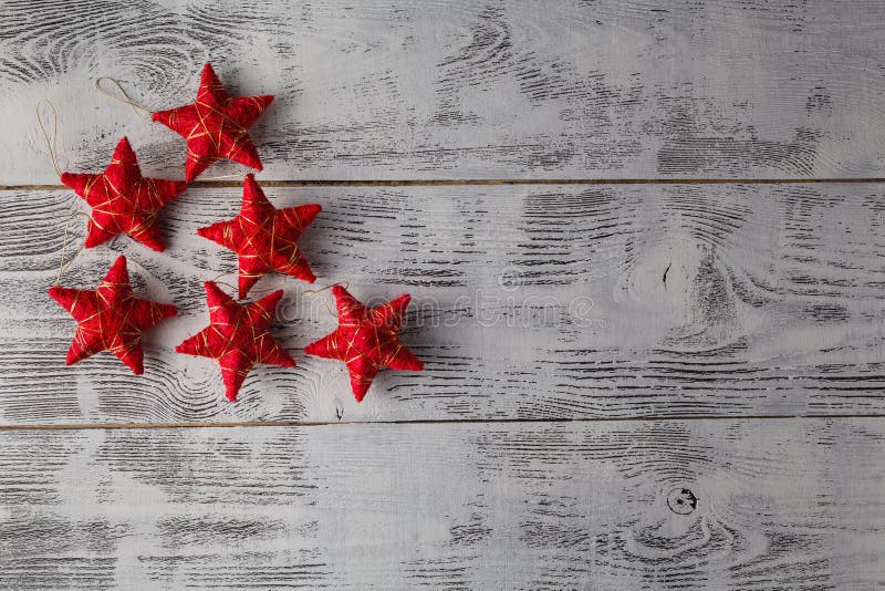 Christmas decoration.Red Christmas stars on rustic dark wooden b royalty free stock photography Christmas decoration.Red Christmas stars on rustic dark wooden b royalty free stock photography