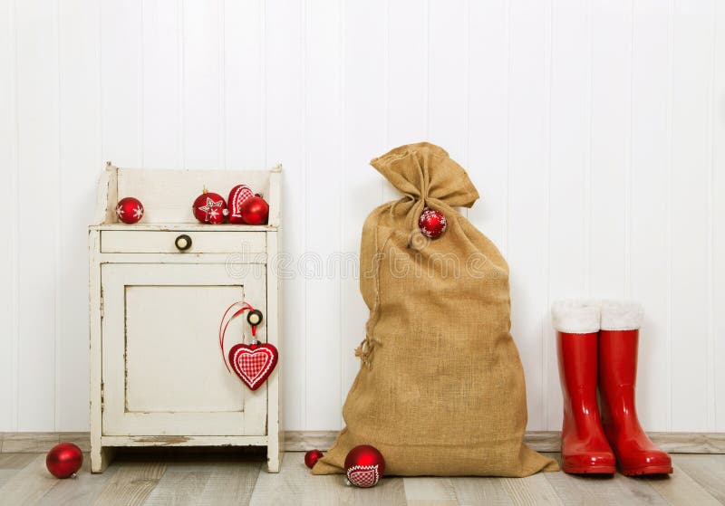 Christmas decoration in red and white colors with sack, presents