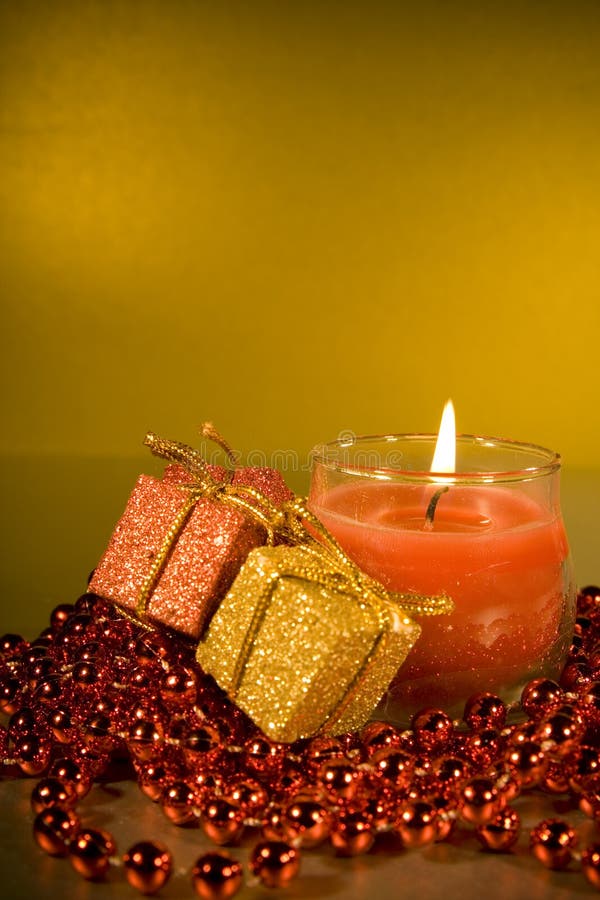 Christmas decorations with lit Candle