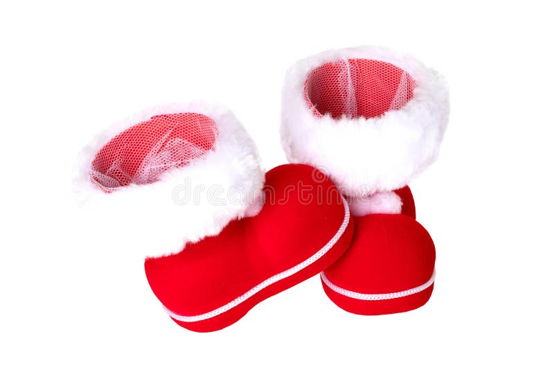 Christmas decorations. A pair of red Christmas boots or Santa Claus boots isolated on a white background royalty free stock images Christmas decorations. A pair of red Christmas boots or Santa Claus boots isolated on a white background royalty free stock images