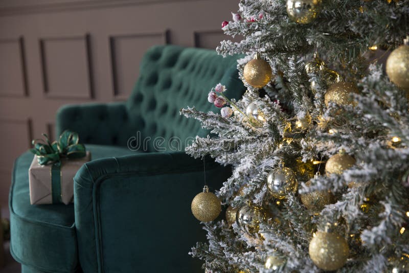 Christmas decorations in photo studio with beautiful Christmas tree for professional photo shoots