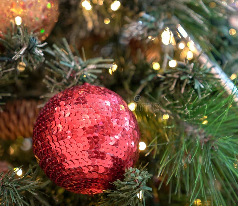 Christmas decorations on xmas tree with hanging balls and ornaments and bokeh background royalty free stock image Christmas decorations on xmas tree with hanging balls and ornaments and bokeh background royalty free stock image