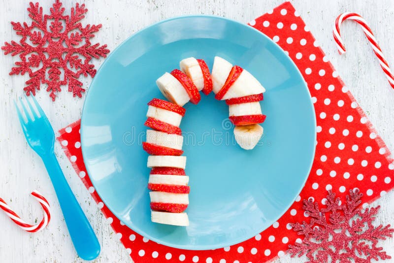 Christmas dessert snack breakfast for kids - banana strawberry c stock images Christmas dessert snack breakfast for kids - banana strawberry c stock images