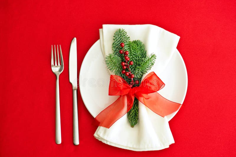 Christmas Dinner Place Setting In Red Stock Image - Image of pine