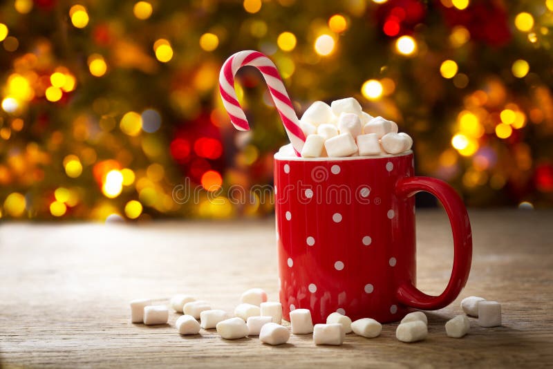 Premium Photo  Tasty red candy cane in a cup on red background