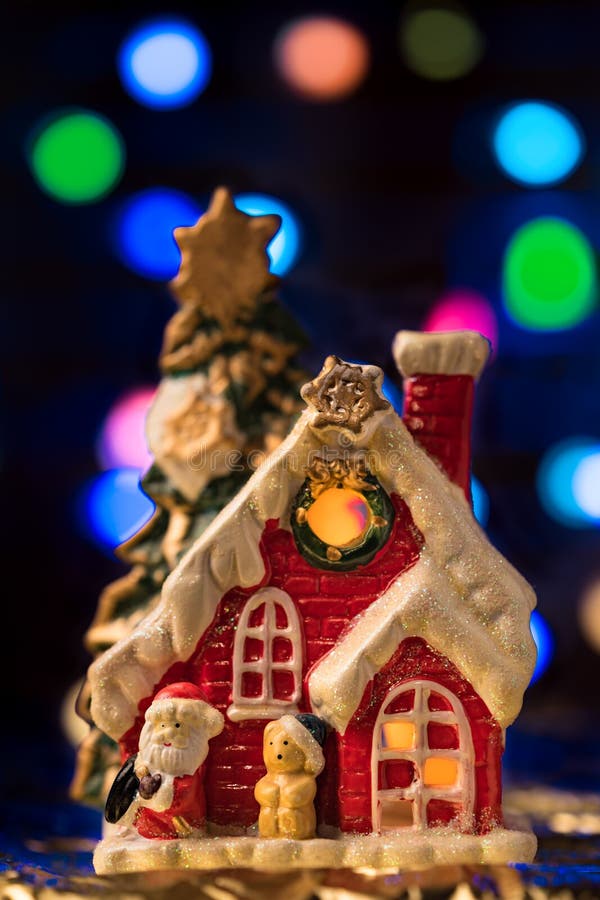 Christmas Fairy House with Santa Claus on Colored Bokeh Background ...